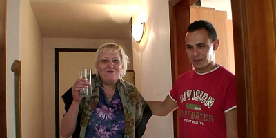 Mature woman with massive boobs giving a titjob after shower