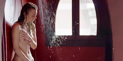 Lovely chick with small boobs is taking a hot shower