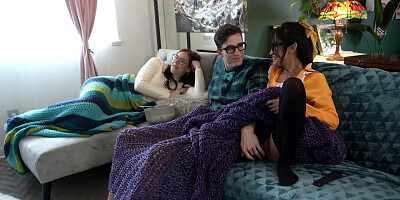 Nerdy couple is fucking on the couch in front of the other girl