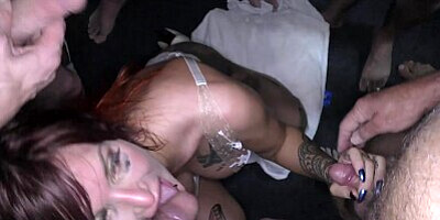 Stunning inked slut Alexxavice sucks cocks and takes massive bukkake facials