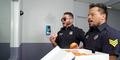 Brunette babe blows a cop and gets fucked in interrogation room
