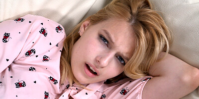 Gorgeous amateur blonde is masturbating on the couch