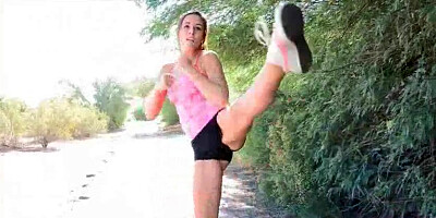 Completely naked and shows off her karate skills by punching and kicking in the nude