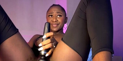 Gorgeous ebony orgasms during machine sex