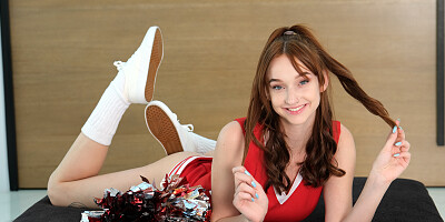 Redheaded cheerleader is going to give him head and more
