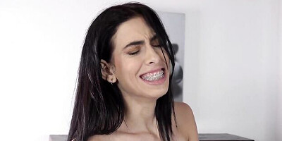 Gorgeous brunette Alicia Trece plays with a long green dildo