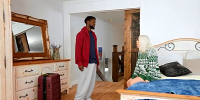 Naughty black man fucks girlfriend's mom in the kitchen