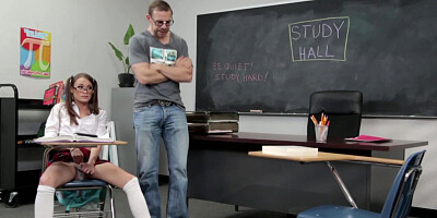 A hot schoolgirl is kissing a cock in the classroom in this scene