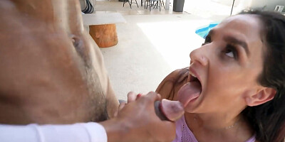 Slutty brunette sucks and rides a big black cock outdoors