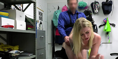 Slender blonde copulates with security officer in his cabinet