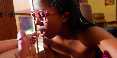 Bootylicious ebony girl shows a lovely ass while sucking a dick