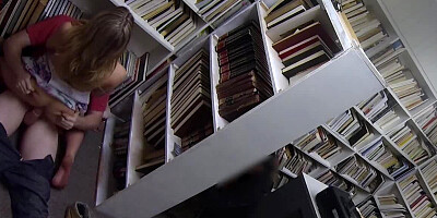 Horny blonde whore is in the library, fucked by her eager friend