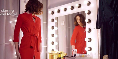 Sultry brunette watches herself in the mirror as she masturbates