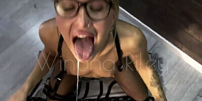 Winona Riley tastes cum in a very sexy way.