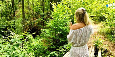Married MILF lagged behind the tourist group and was fucked right on the forest path.