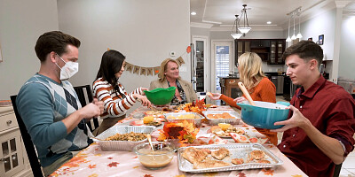 The family is celebrating the holidays with an orgy