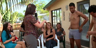 Dirty MILFs and male stripper are having oral sex outside