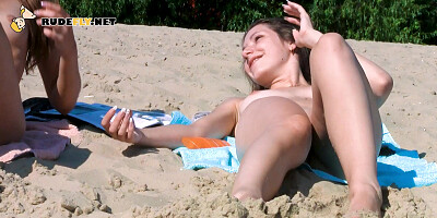 Young nudist with tiny tits that is soaking up the sun
