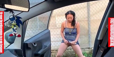 Chinese woman is peeing in front of the camera and making an outstanding close- up