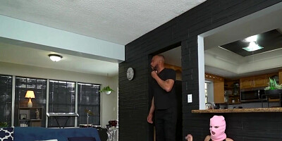 She wears a robber mask and gets caught by a person