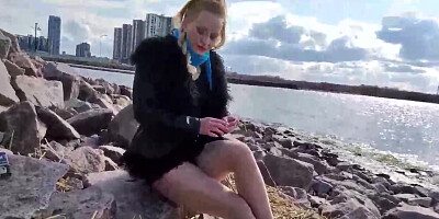 Mature platinum-blonde doll in crimson footwear with high high-heeled slippers is frequently dressed in nylons and mini skirts