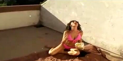 Frolic dark haired cougar is fellating her neighbor's pecker and getting pounded rock hard, from the back