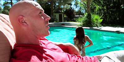 Madison Ivy gives double handed bj before getting stuffed with cock poolside