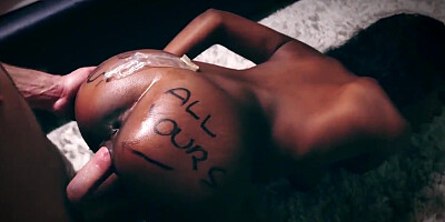 Ebony lets a white fellow touch her