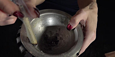 Blond stunner is smoking pot and opening up up broad to display vulva, just for joy