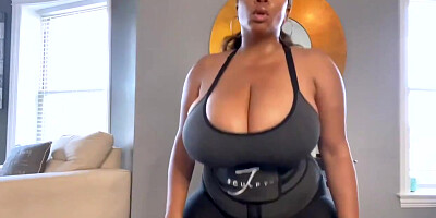 Gigantic breasted, Dark-Hued chick is posing stripped to the waist on web cam, because it exhilarates her a pile