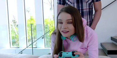 Petite chick banged by boyfriend while playing video game