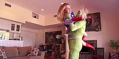 Horny babe was wearing a super hero costume while having sex with a guy dressed as monster