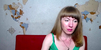 Amateur MILF covering small tits on webcam