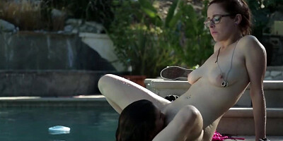 Two lesbians are having some wicked fun by the pool and enjoy it