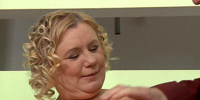 A fat blonde granny removes her panties and she shakes her ass