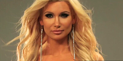 Busty blonde posed during photo session