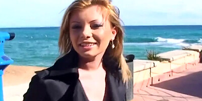 Blonde MILF walks on the beach before sex