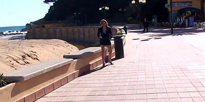 Blonde MILF walks on the beach before sex