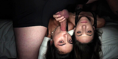 Two brunette girls are face-fucked by a big-dicked guy
