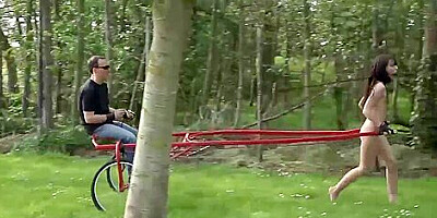 Teen Humiliated tied to a cart and slapped with towel