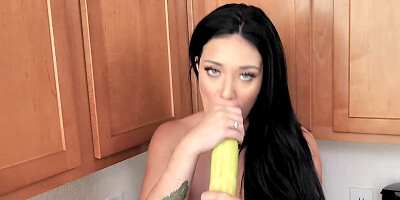 Depraved brunette is rubbing her pussy with a banana