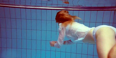 Crimson haired honey, Dashka is oftentimes swimming downright bare, not knowing that someone is eyeing her