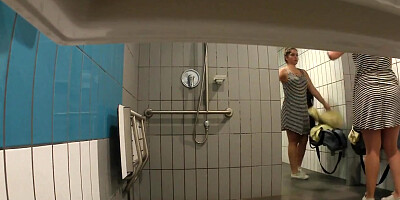Sportsgirl feels water drops on skin in shower