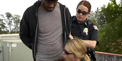 Horny dude ends up fucking two cops on the roof