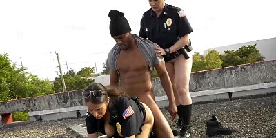 Horny dude ends up fucking two cops on the roof