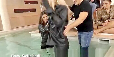 Slut in ripped leather pants fucked as a group of people watch