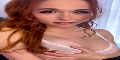 Chesty red-haired is fingerfucking herself in front of the camera and lovin’ it a bunch