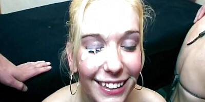Pretty German blonde teen covered with cum after gangbang action