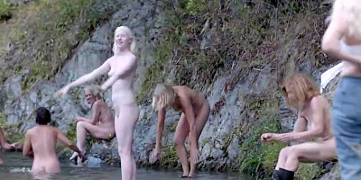 Elisabeth Moss is making out with her paramour, in the woods, before having fuck-fest with him