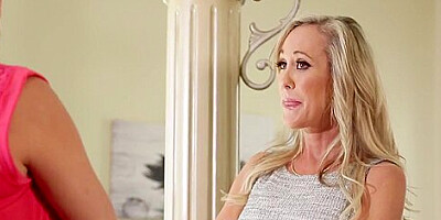 Brandi Love is making love with Peta Jensen and fucking her with a strap- on